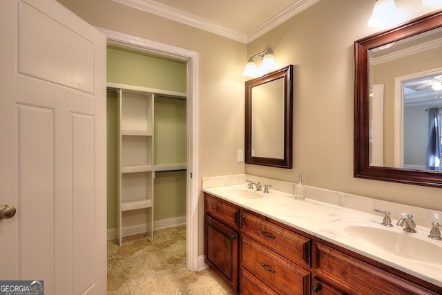 bathroom with vanity and ornamental molding