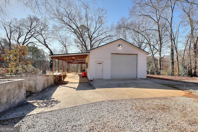 garage featuring a carport