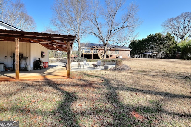 view of yard featuring a patio