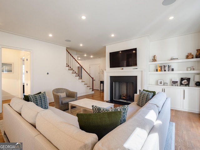 living room with light hardwood / wood-style floors