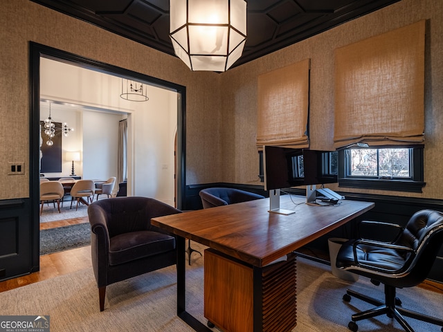 office space with a chandelier and light hardwood / wood-style flooring