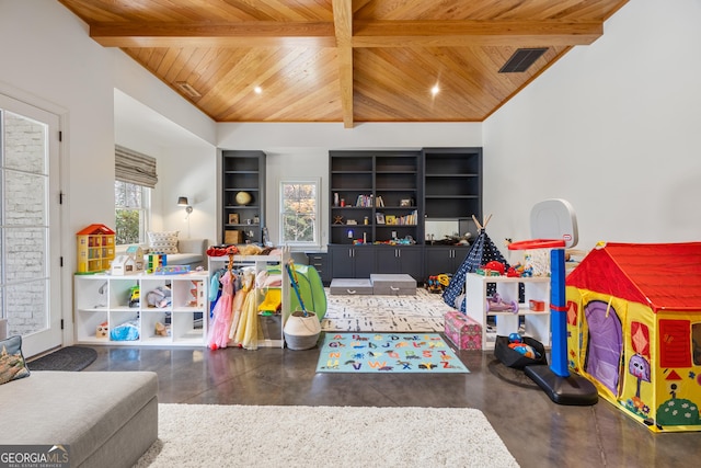 recreation room featuring lofted ceiling with beams, concrete floors, and wooden ceiling