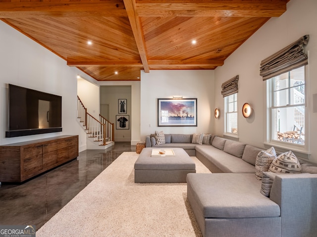 living room with wood ceiling and beamed ceiling