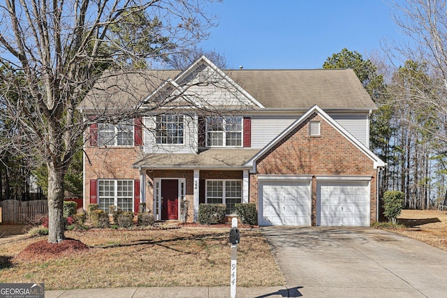 view of front of property with a garage