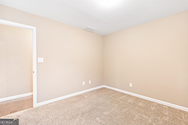 empty room with carpet floors