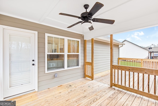 wooden deck with ceiling fan