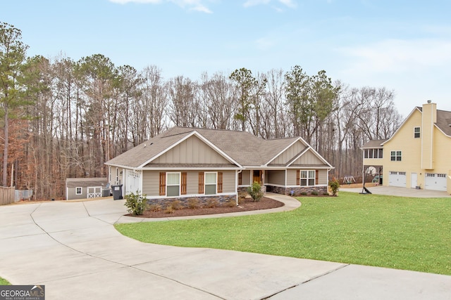 craftsman-style house with a garage and a front yard