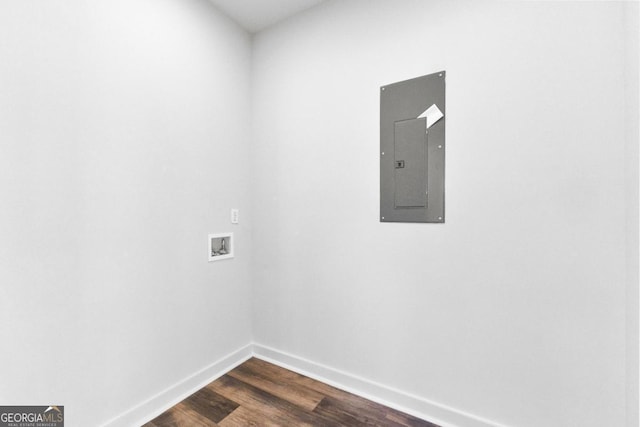 laundry area featuring hookup for a washing machine, electric panel, and dark hardwood / wood-style floors