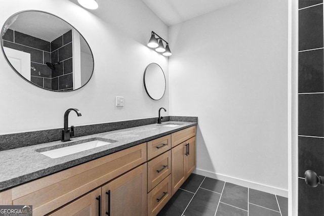 bathroom with vanity and tile patterned floors