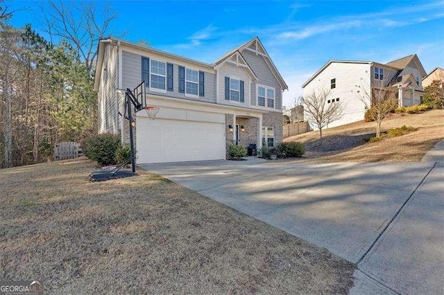 front of property with a garage and a front yard