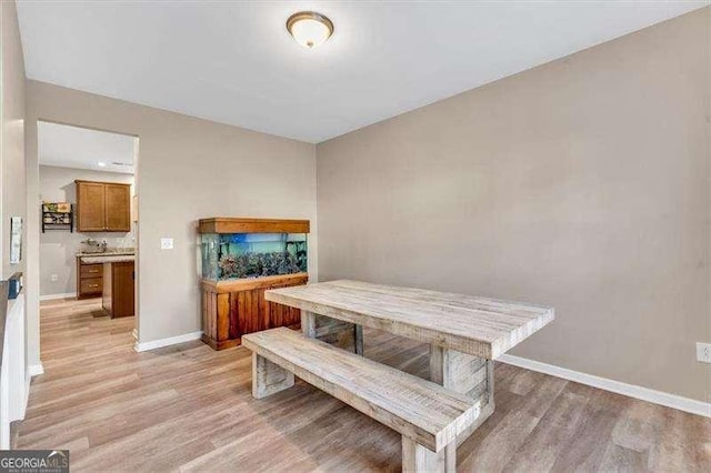 dining room featuring light wood-type flooring