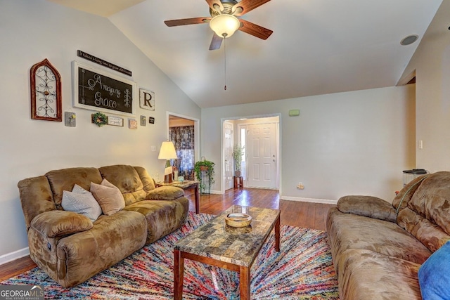 living room with hardwood / wood-style floors, vaulted ceiling, and ceiling fan