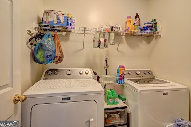 laundry area with washer and clothes dryer