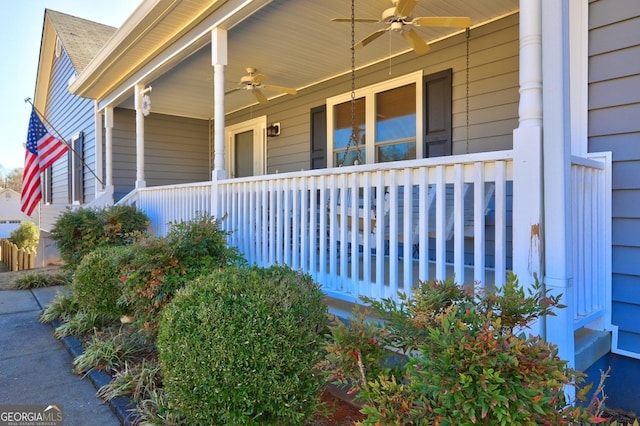 entrance to property featuring ceiling fan and a porch