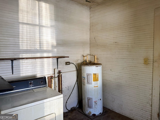 washroom with washer / clothes dryer and water heater