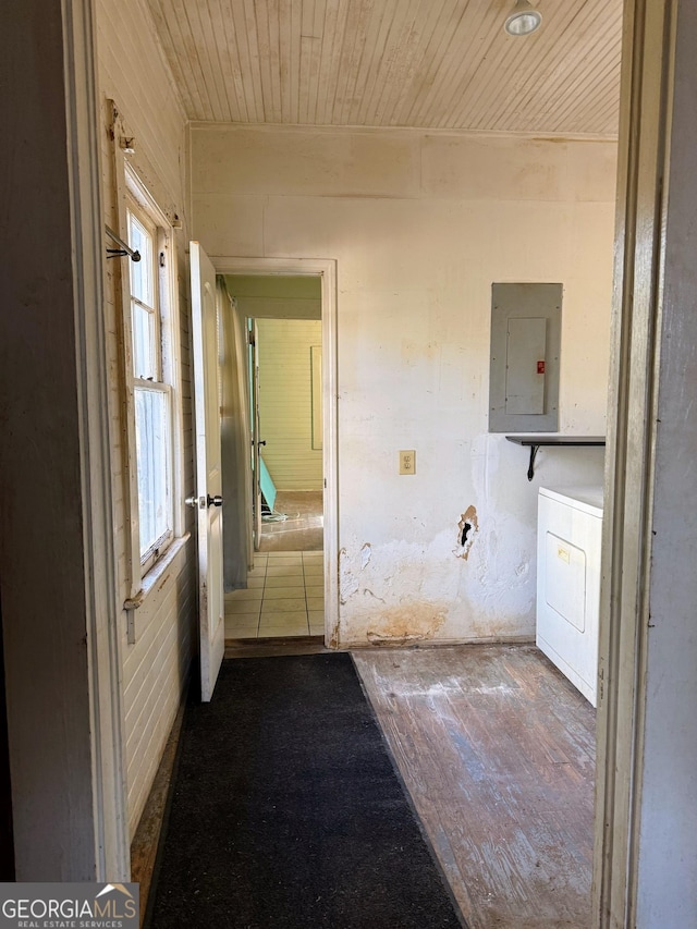 bathroom featuring wood ceiling, washer / clothes dryer, and electric panel