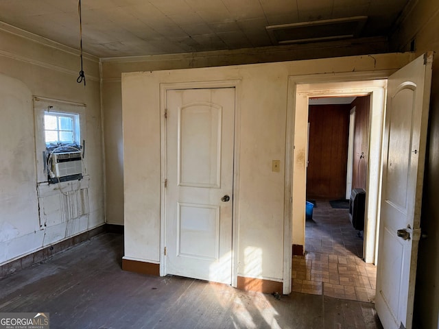 interior space with cooling unit and dark hardwood / wood-style flooring