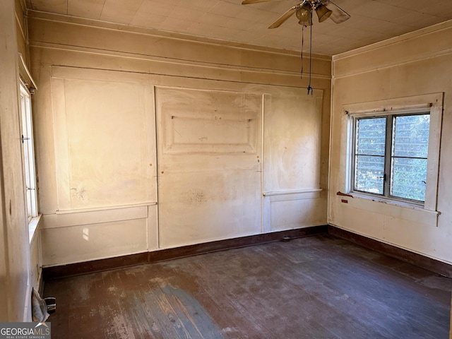 unfurnished bedroom with dark hardwood / wood-style floors and a closet