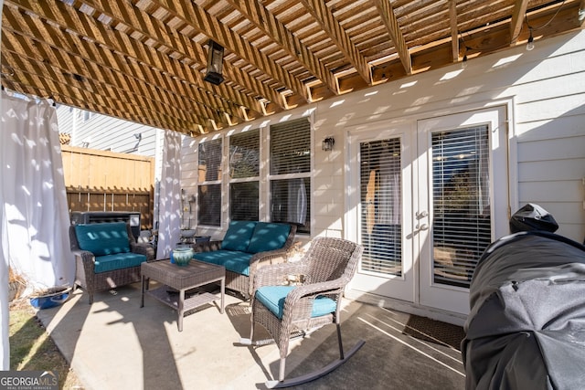 view of patio with french doors, outdoor lounge area, and a pergola