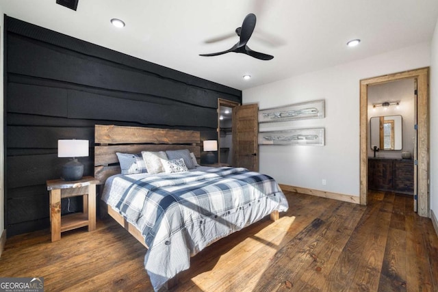 bedroom featuring dark wood-type flooring and ceiling fan