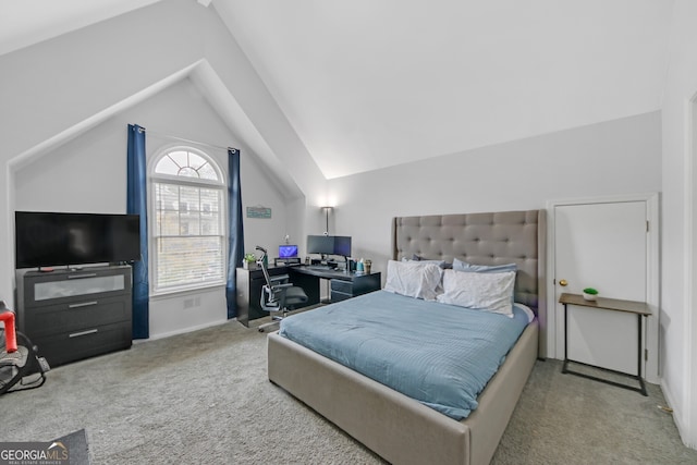 carpeted bedroom featuring vaulted ceiling