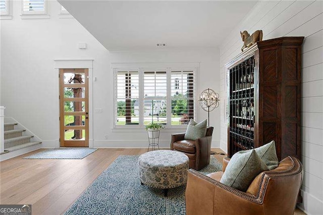 living area with light hardwood / wood-style flooring