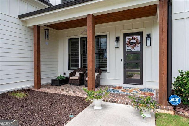 entrance to property with covered porch