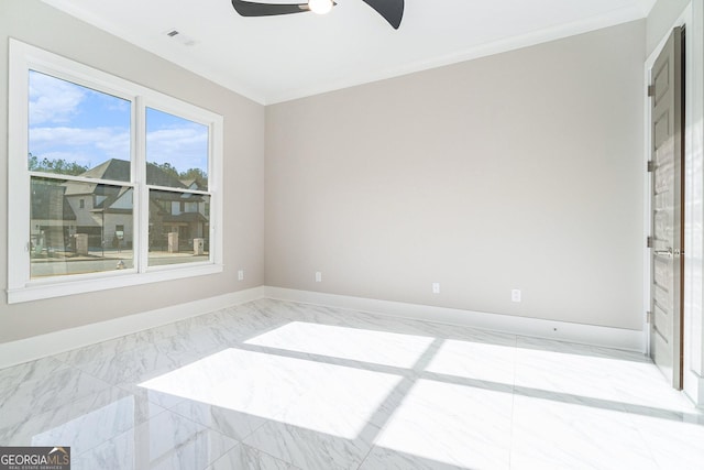 unfurnished room with a ceiling fan, visible vents, baseboards, marble finish floor, and ornamental molding