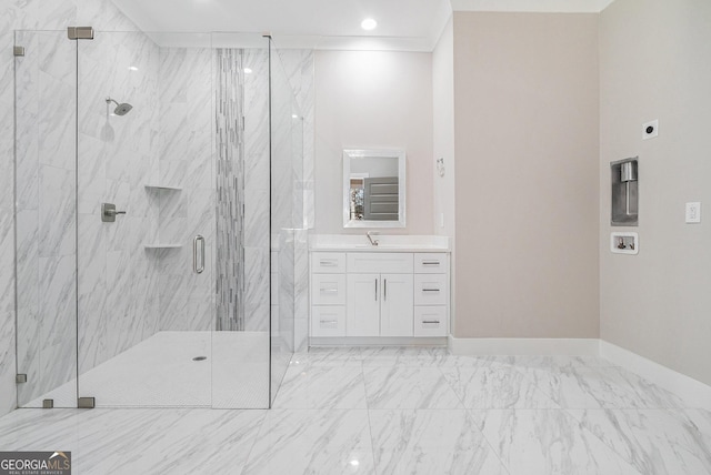 full bath featuring vanity, baseboards, marble finish floor, a marble finish shower, and crown molding