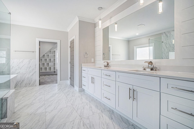 bathroom with a walk in shower, a sink, marble finish floor, ornamental molding, and double vanity