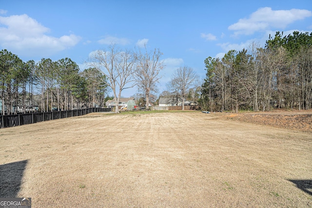 view of yard with fence