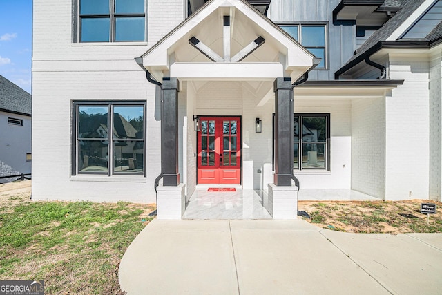 entrance to property with brick siding