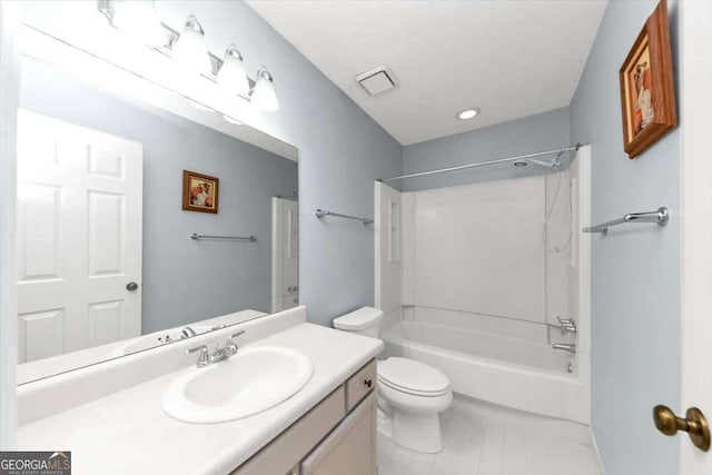 full bathroom featuring vanity, shower / washtub combination, and toilet