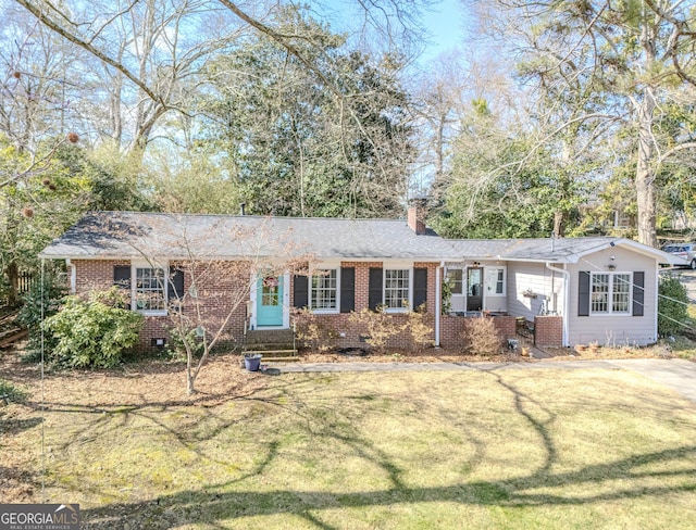 ranch-style house featuring a front lawn