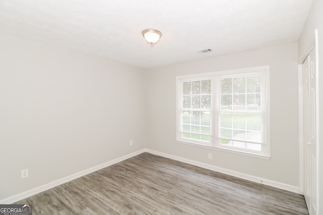 20 Oak Wood Ln, Covington, GA 30016 - empty room with hardwood / wood-style flooring