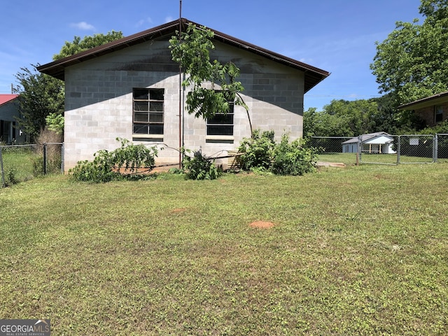 view of home's exterior featuring a yard