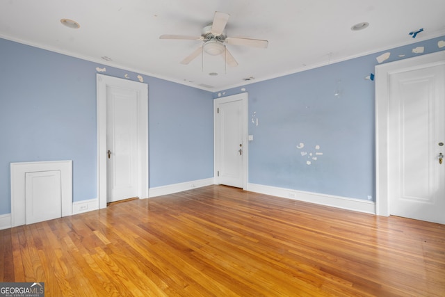 unfurnished room featuring crown molding, ceiling fan, and light hardwood / wood-style floors