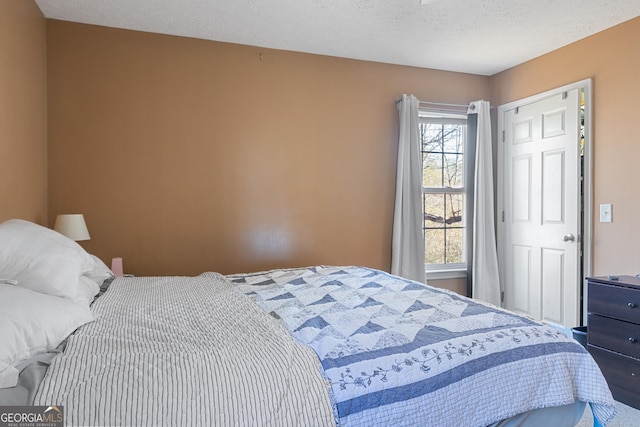 bedroom with a textured ceiling