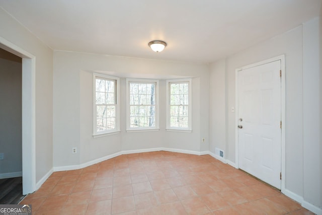 view of tiled spare room