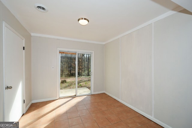 tiled empty room with ornamental molding