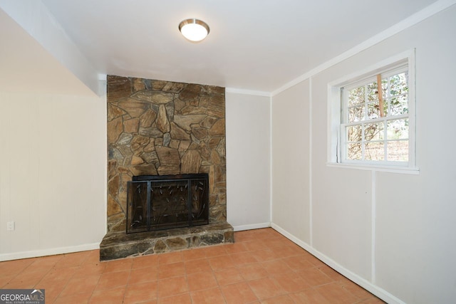 interior details featuring crown molding and a fireplace