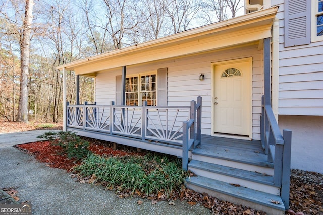 entrance to property with a porch