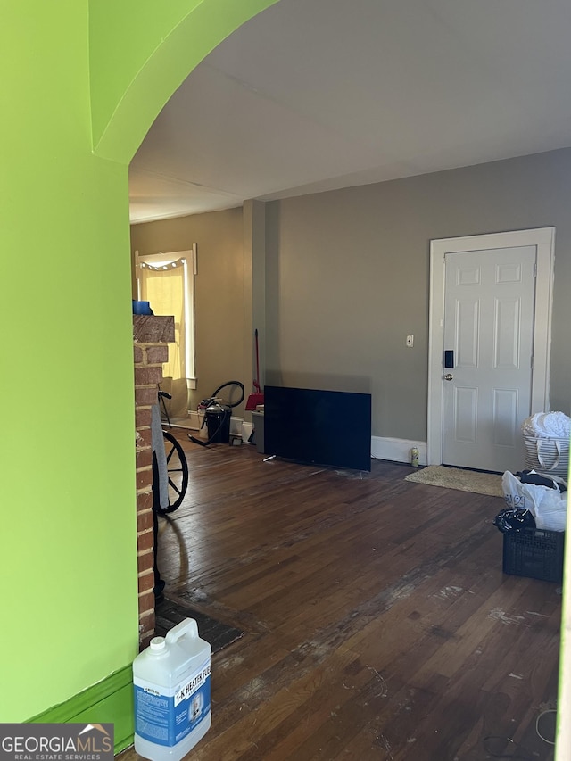 interior space with dark hardwood / wood-style flooring