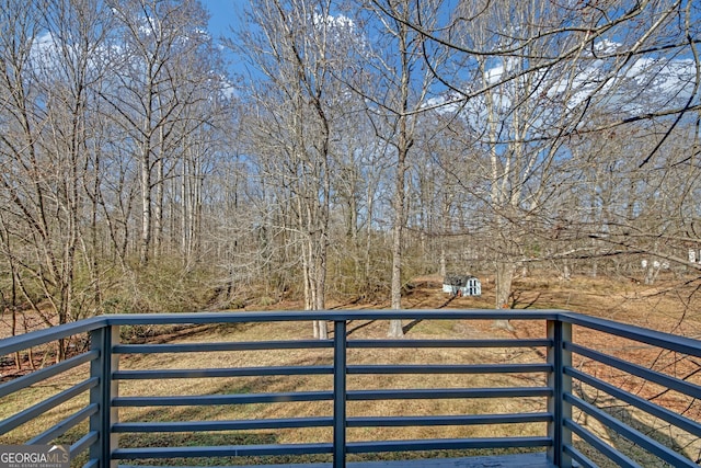 view of yard with a balcony