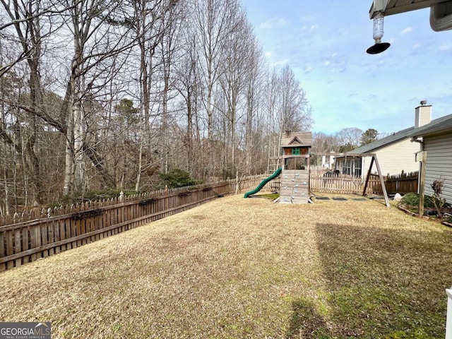 view of yard with a playground