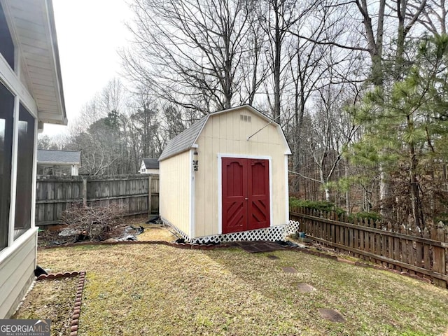 view of outdoor structure with a yard