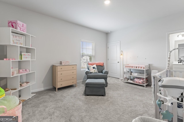 bedroom with light colored carpet