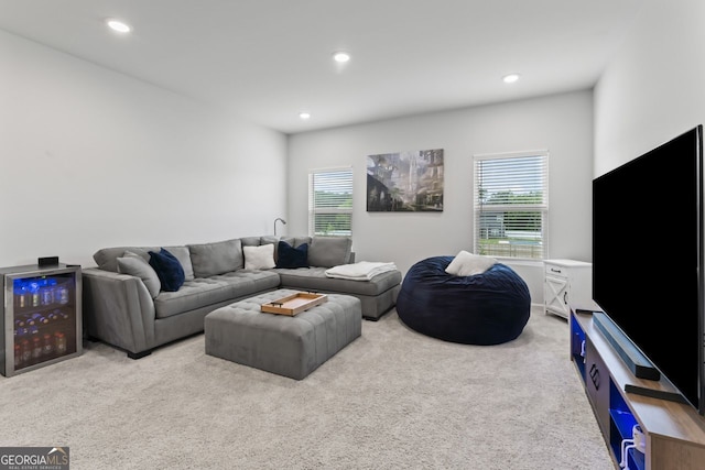 carpeted living room featuring beverage cooler