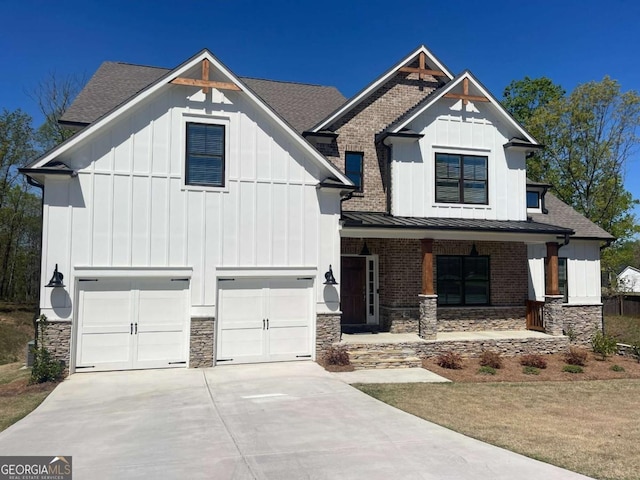 view of front of house featuring a garage and covered porch