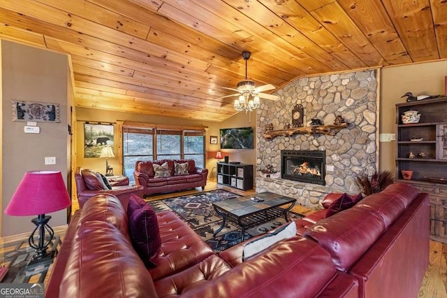 living room with wood ceiling, a fireplace, vaulted ceiling, and hardwood / wood-style flooring